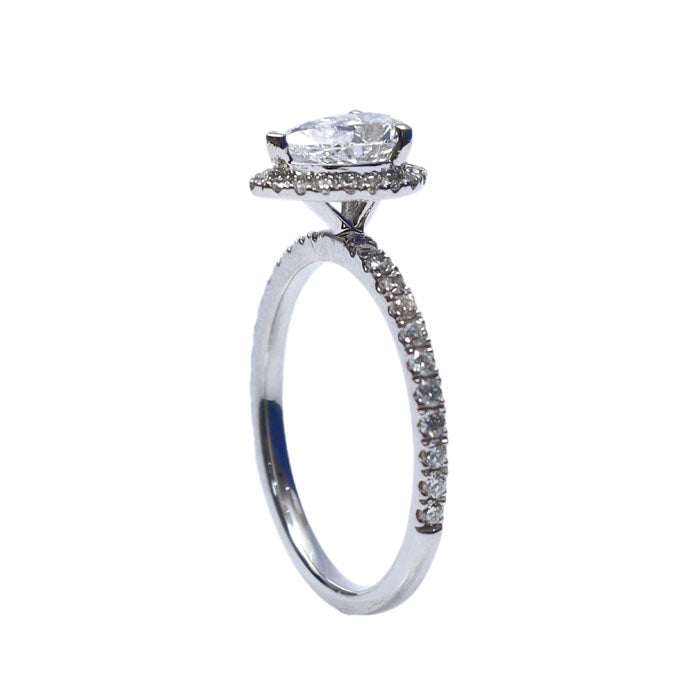 Single Halo Pear Shape Diamond Ring